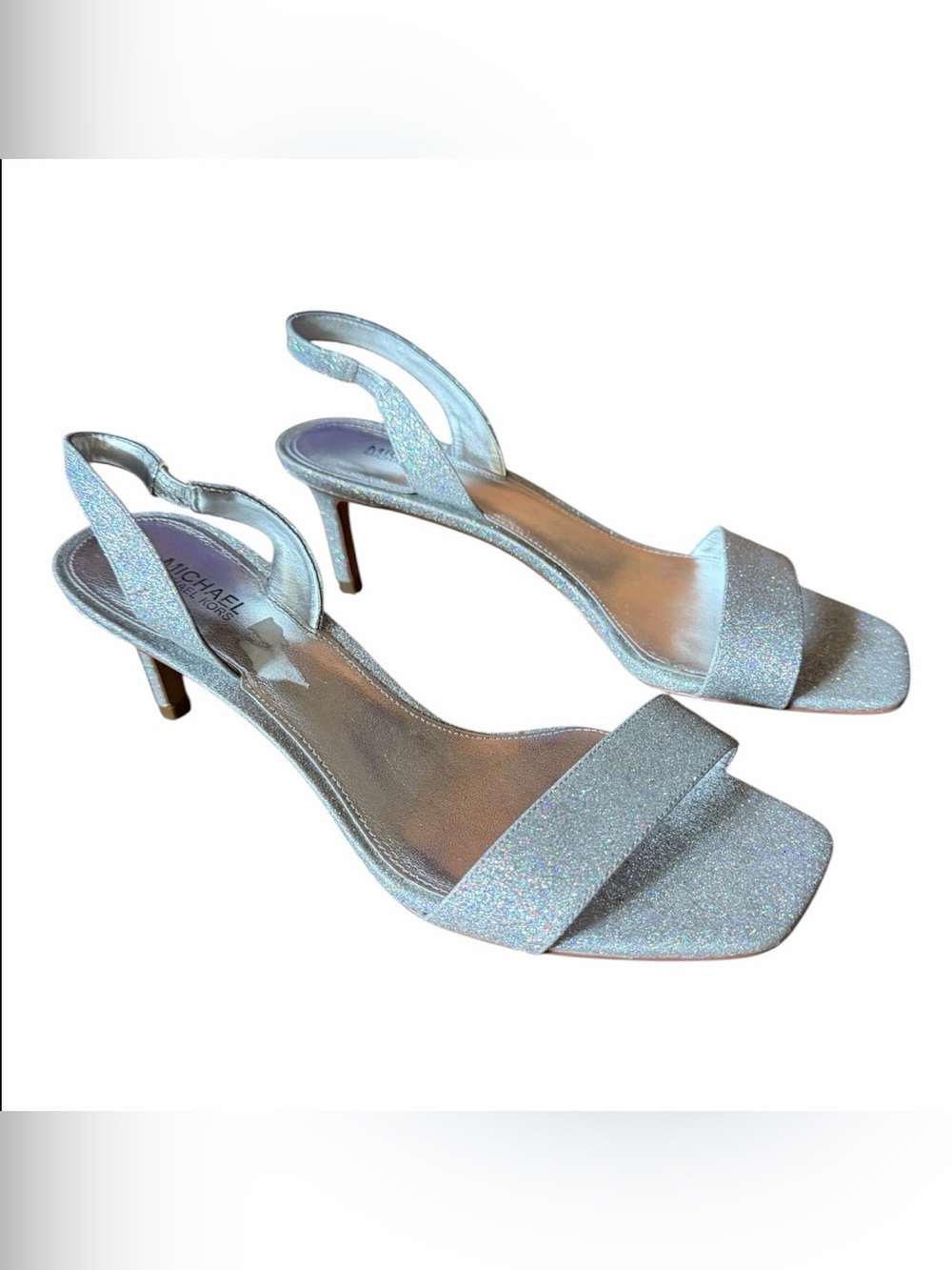 Woman’s Michael Kors Silver Glitter Slingback Heels